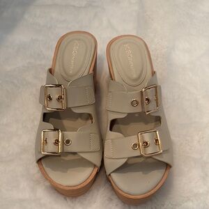 BCBGeneration Cream Sandals with Gold Buckles